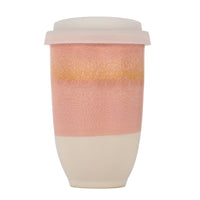 ceramic travel coffee cup with pink orange and beige design