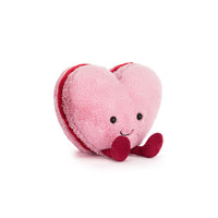 Heart-shaped plush toy with a smiling face jellycat