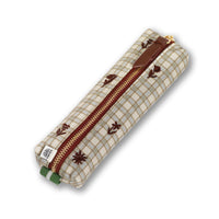 A fabric zippered pencil case with a beige and brown plaid pattern, brown embroidered floral motifs