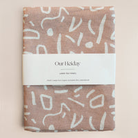 neutral Linen tea towel with abstract white pattern