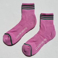 Pink socks with green stripes