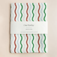 colorful holiday ribbon patterned linen tea towel