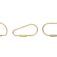 assortment of brass keyrings