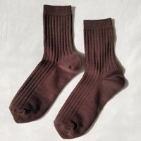 her socks in the color coffee