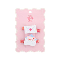 Set of hair clips shaped like envelopes with hearts