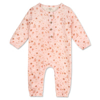 pink long sleeve baby jumpsuit with a floral pattern