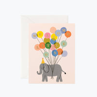 elephant with balloons tied around it that say welcome little one
