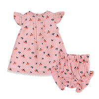 Pink baby dress with a strawberry pattern and matching bloomers