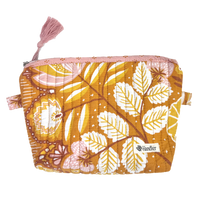 Yellow Floral patterned pouch with a pink tassel