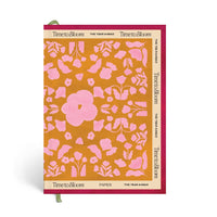 Floral patterned planner with 'Time to Bloom' branding daily planner
