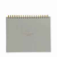 weekly overview desk planner with a light sage cover