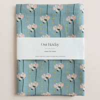 Linen tea towel with floral pattern