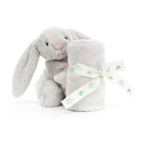 Bashful grey bunny attached to small blanket