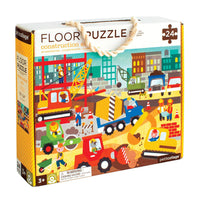 Box of a construction-themed floor puzzle with colorful illustrations on a white background