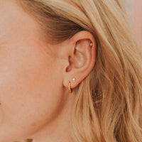 Cross stud earrings