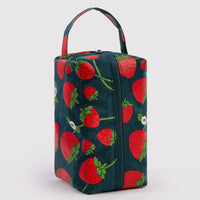 dark teal cosmetic bag with a strawberry pattern