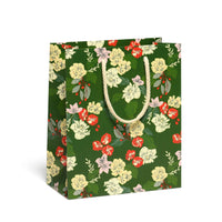 Green and red floral-patterned gift bag