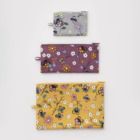 Three zippered pouches with floral prints