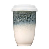 ceramic travel cup with a silicone sleeve and lid 12 oz
