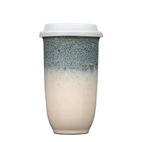 ceramic travel cup with a silicone sleeve and lid 16 oz