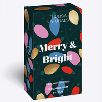 2 pack of bergamot plum scented shower steamers in a box that say merry and bright