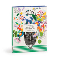Paint by number kit packaging with floral design and vase illustration on a white background