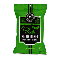 Green bag of Spicy Dill Pickle kettle cooked potato chips with Pop Daddy branding.