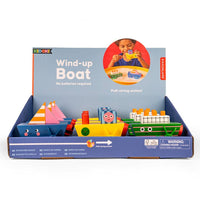 Kiddieland wind-up boat set packaging with toy boats and child playing on a white background