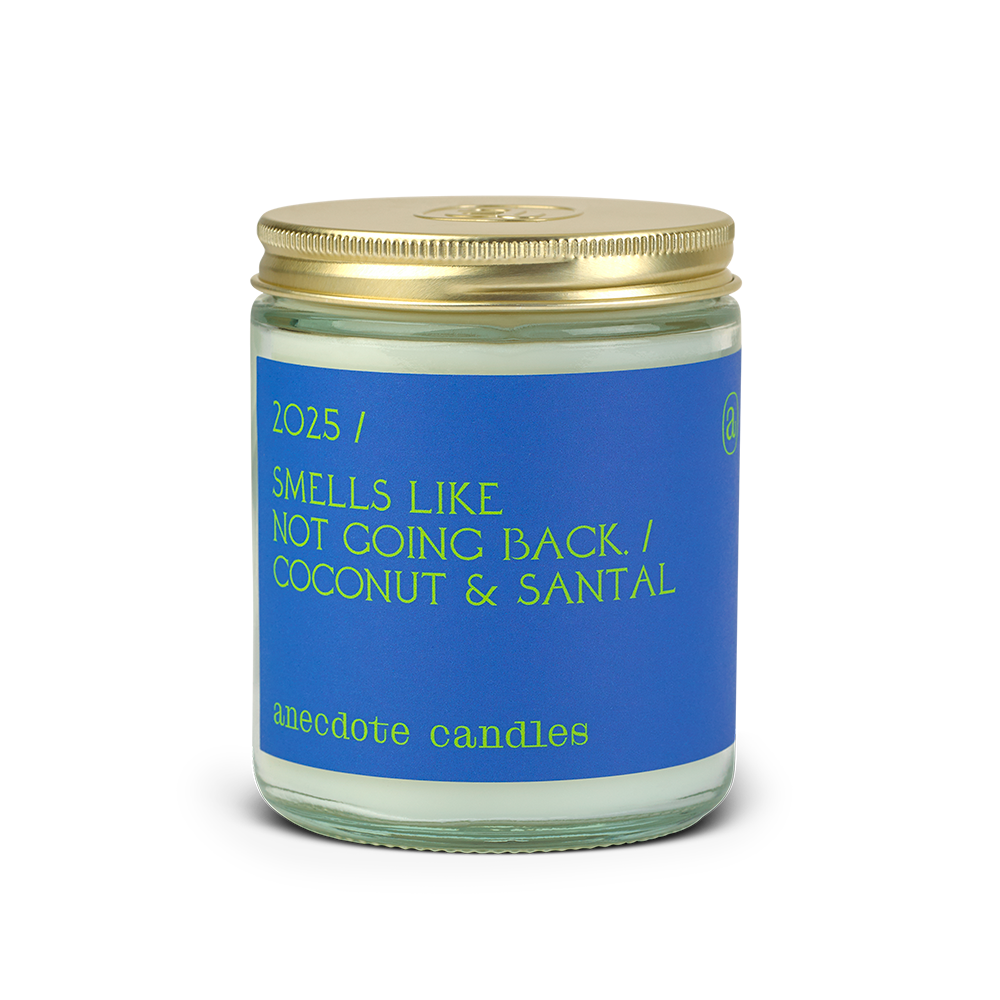 2025 themed candle with coconut and santal scent notes 