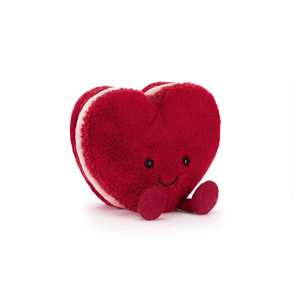Red heart-shaped plush toy with a smiley face jellycat