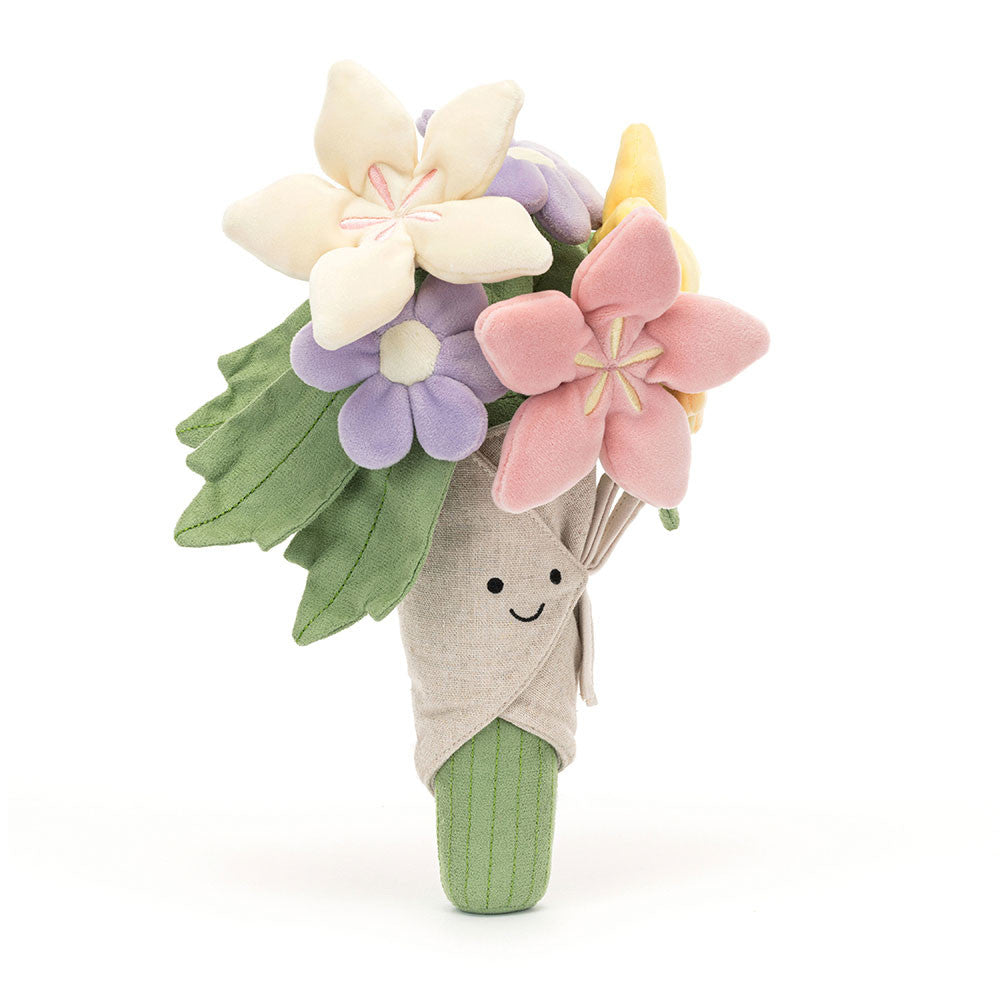Plush toy resembling a bouquet of flowers with a smiling face 