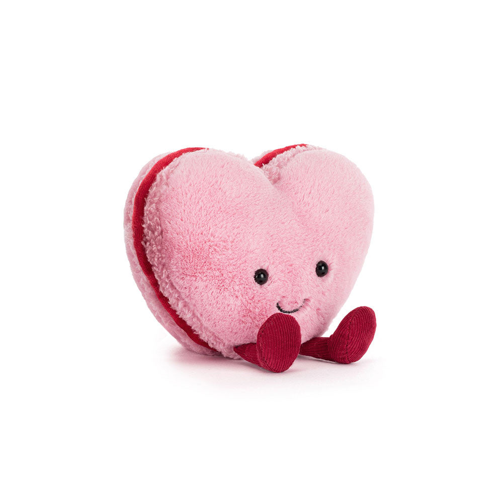 Heart-shaped plush toy with a smiling face jellycat