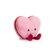 Heart-shaped plush toy with a smiling face jellycat