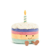 Plush toy cake with a candle 