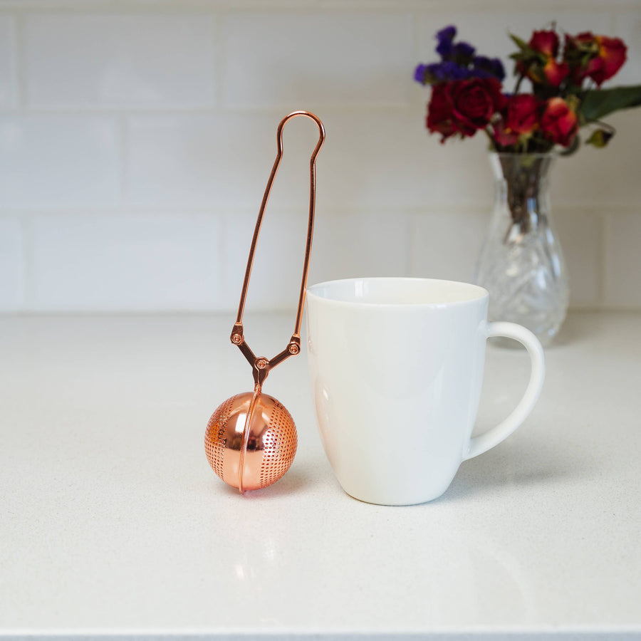 rose gold tea strainer