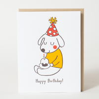 Cartoon dog in a party hat with a birthday cupcake and candle 
