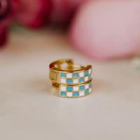 blue and white checkered hoops on gold fill huggie style earring