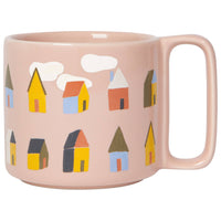 blush pink mug with houses and clouds on it