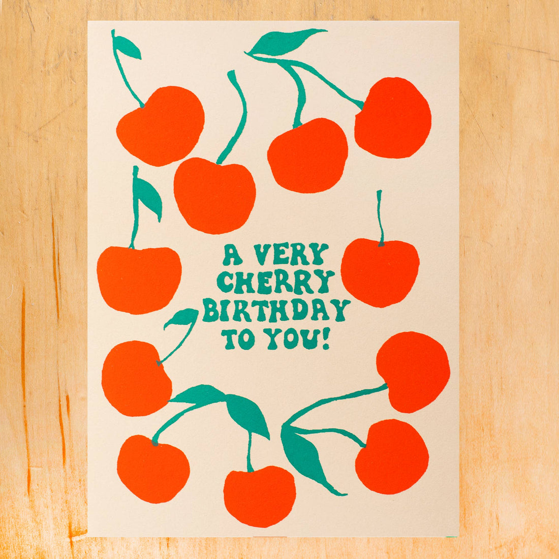 Card with red cherries featuring the text 'A Very Cherry Birthday To You!' 