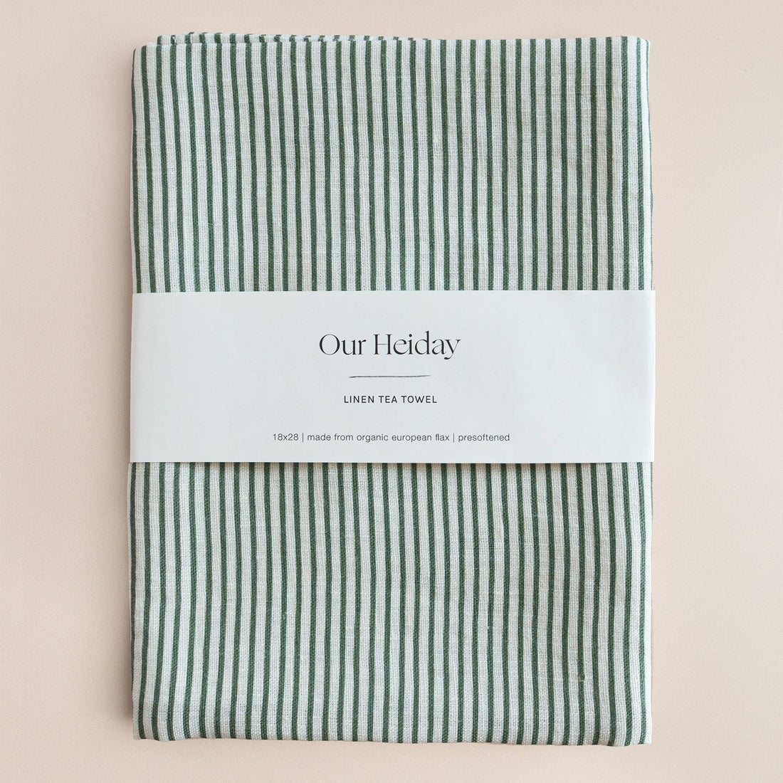green striped linen tea towel with 'Our Holiday' label