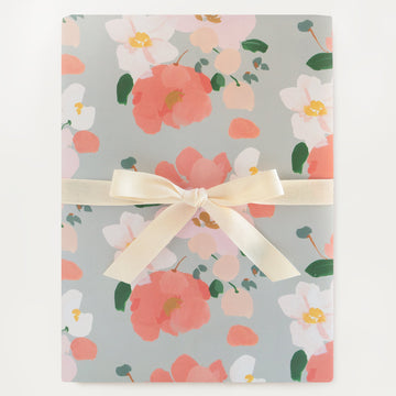 coral floral bloom wrapping paper with a soft blue background