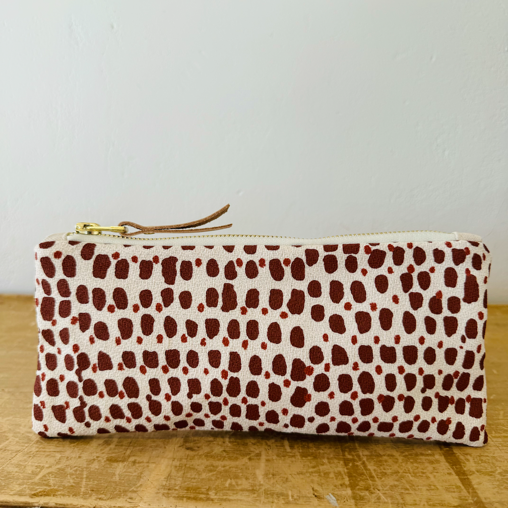 dark red spotted patterned white pencil pouch 