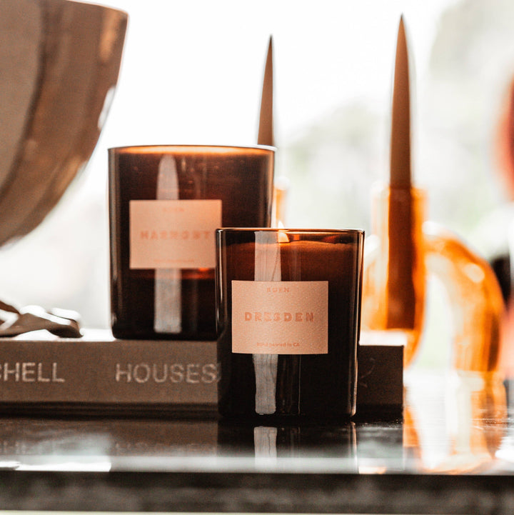 kaffir lime, wild bergamot, marjoram, cracked pepper, and oud scented candle