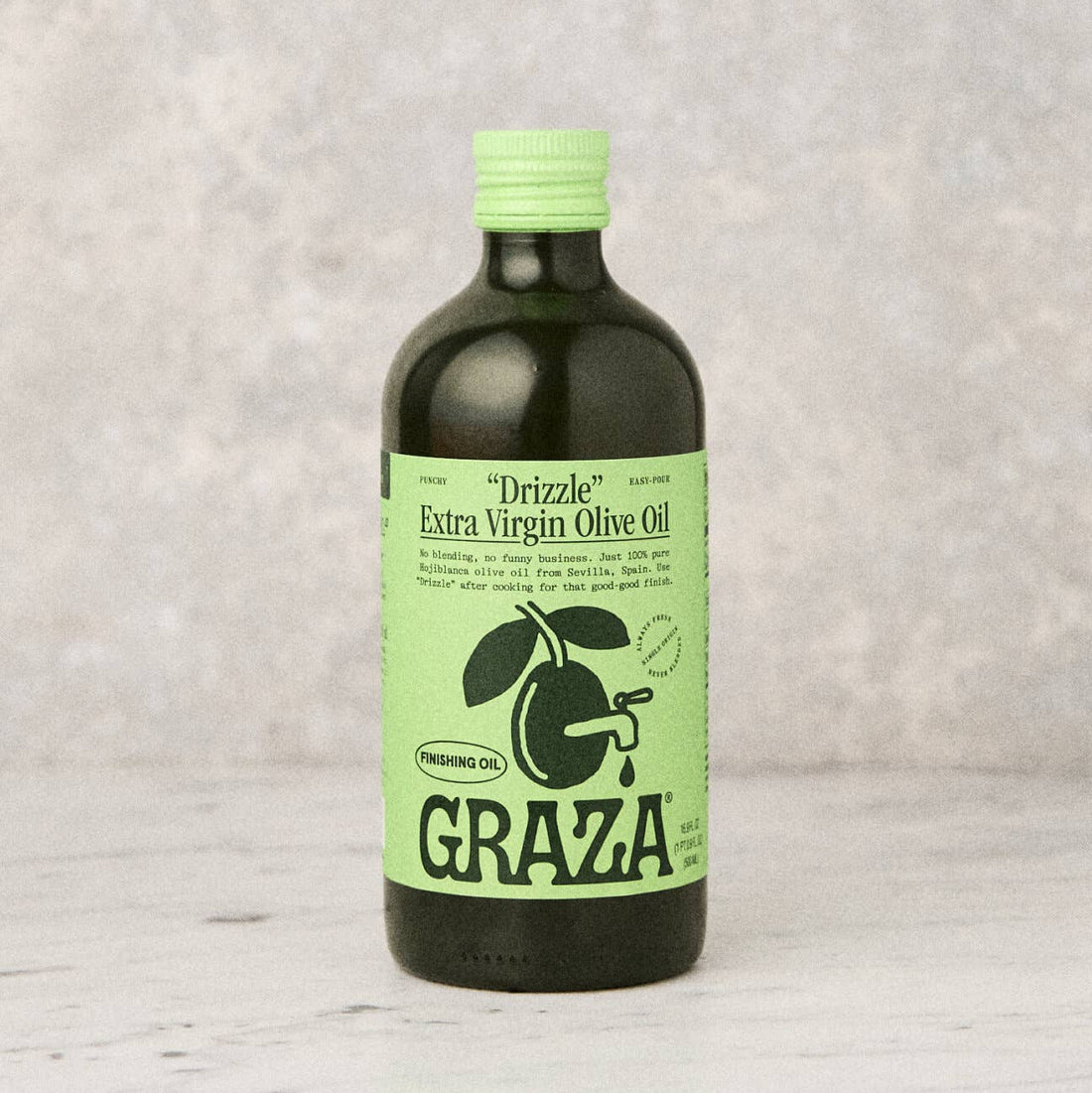 drizzle extra virgin olive oil by graza glass bottle