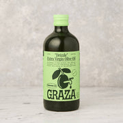 drizzle extra virgin olive oil by graza glass bottle