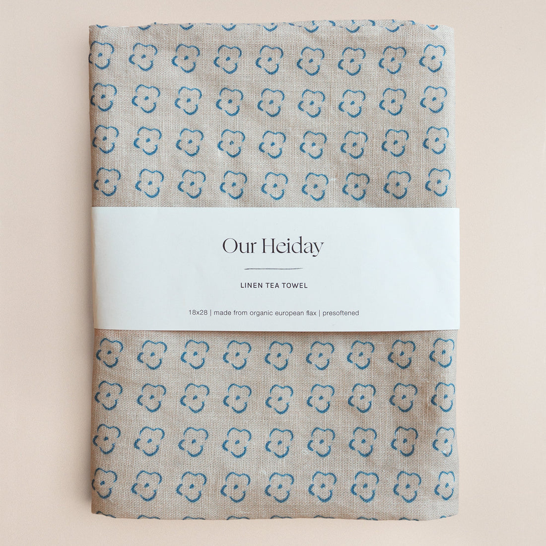 neutral tea towel with cornflower blue florals