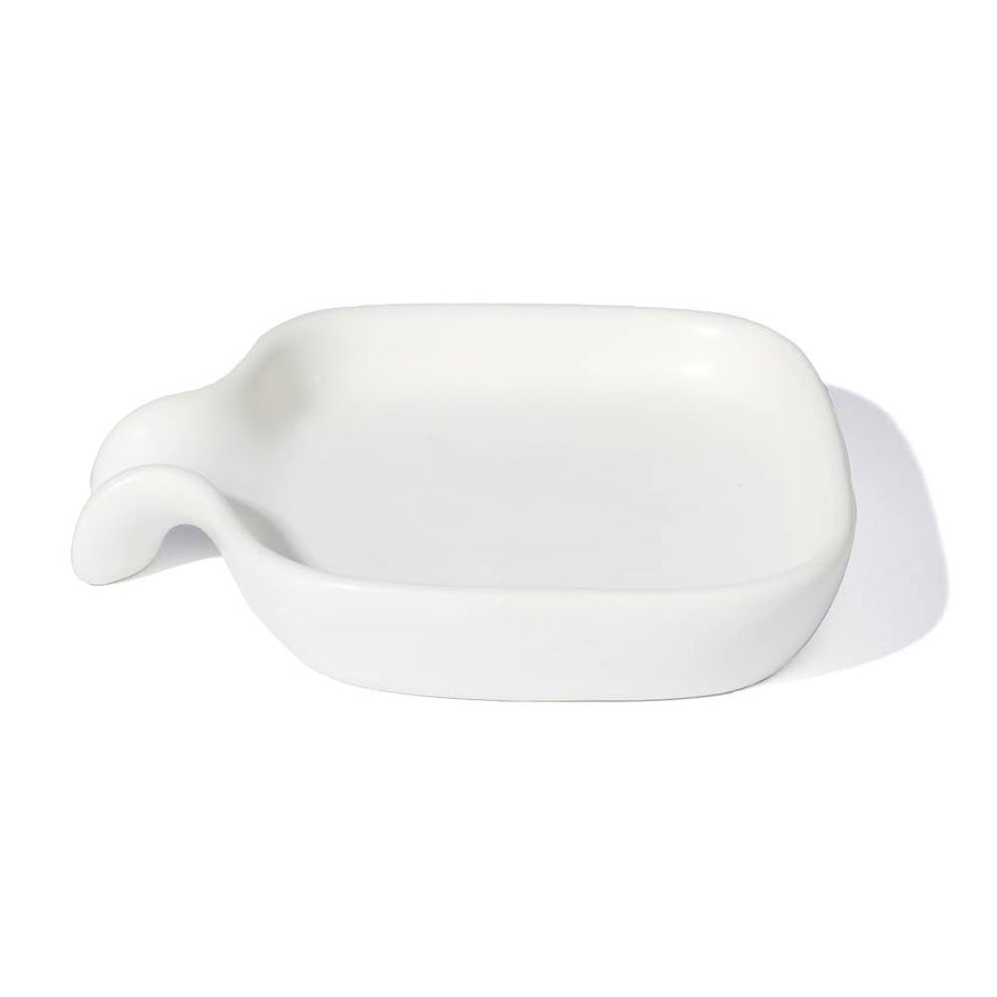 white ceramic dish with dipped end