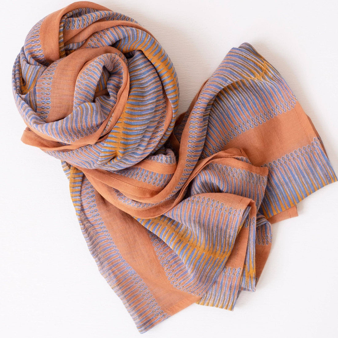 cotton scarf with with large orange stripes and blue accents