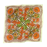 Floral patterned bandana with orange, green, and yellow flowers 