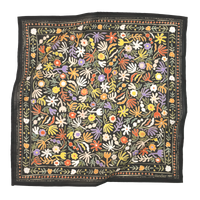 Colorful floral patterned bandana with a black border